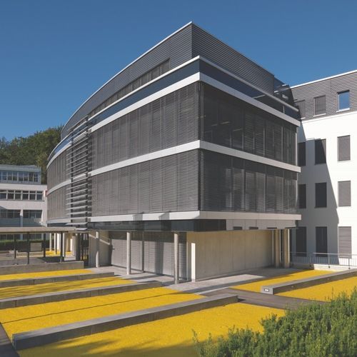 铝制建筑遮阳板 - EC 70 / EC 80 / EC 100 - Schenker Stores - 用于外墙 / 立式 / 机动旋转