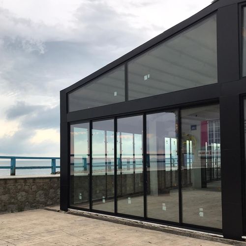 阳台滑动折叠玻璃门 - WITH THRESHOLD - BKS balcony glazing systems - 铝制 / 三叶 / 双叶