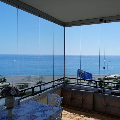 无轨折叠玻璃面板车库门 - BALCONY SYSTEM - BKS balcony glazing systems - 铝制 / 三叶 / 双叶