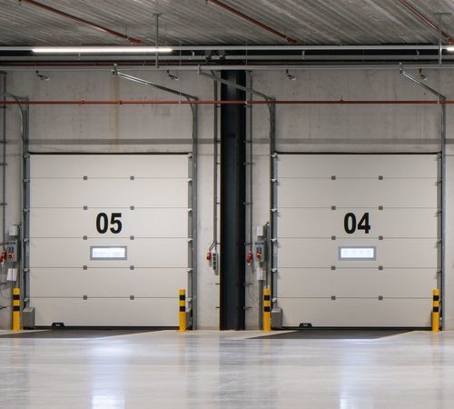 分段工业门 - CRAWFORD OH1142P DUAL DRIVE - ASSA ABLOY Entrance Systems - 钢 / 隔热 / 自动