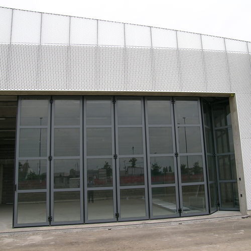 折叠工业门 - FOLDING GLASS - Moreschi Chiusure Industriali S.r.l. - 折叠 / 钢 / 电镀钢