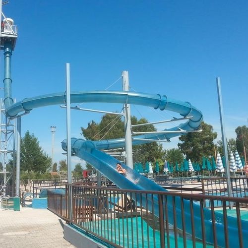旋转滑梯 - FALL LOOP - TECNOPISCINE INTERNATIONAL - 用于水上乐园 / 管状 / 高速