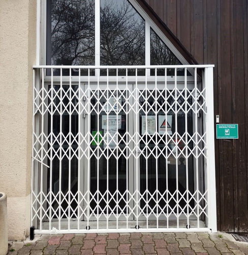 可展开防盗格栅 - DELIAL - La Toulousaine - 门用 / 商店门面 / 电镀钢